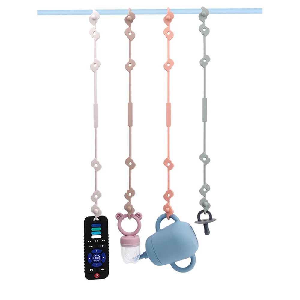 4 attaches doudou tétines avec verre à paille pour bébé, tétine, grignoteuse et télécommande jouet attachés Image