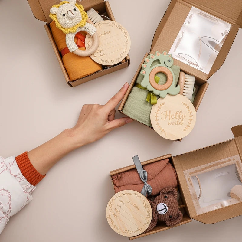 3 Coffrets doudous présenté, lion, dinosaure et ours