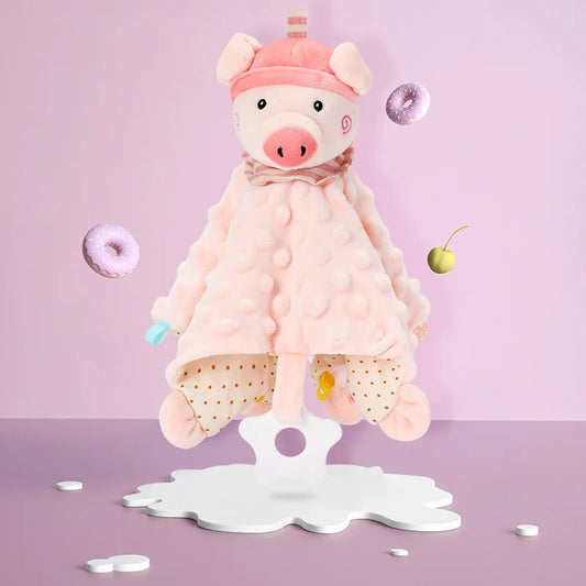 doudou carré rose à tête de cochon rose avec un bonnet, un anneau de dentition blanc en silicone en forme d'étoile