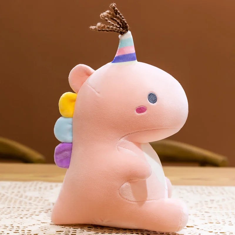 peluche dinosaure licorne rose avec pompons et crête multicolore