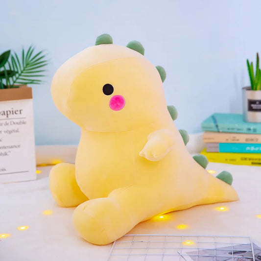 peluche dinosaure jaune avec crête verte 