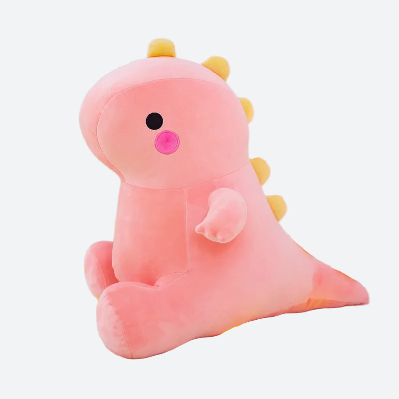 peluche dinosaure rose avec crête jaune