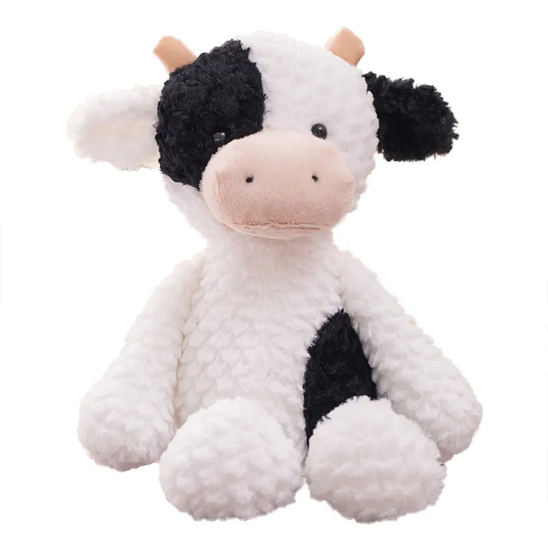 peluche vache blanche et noire avec petite cornes