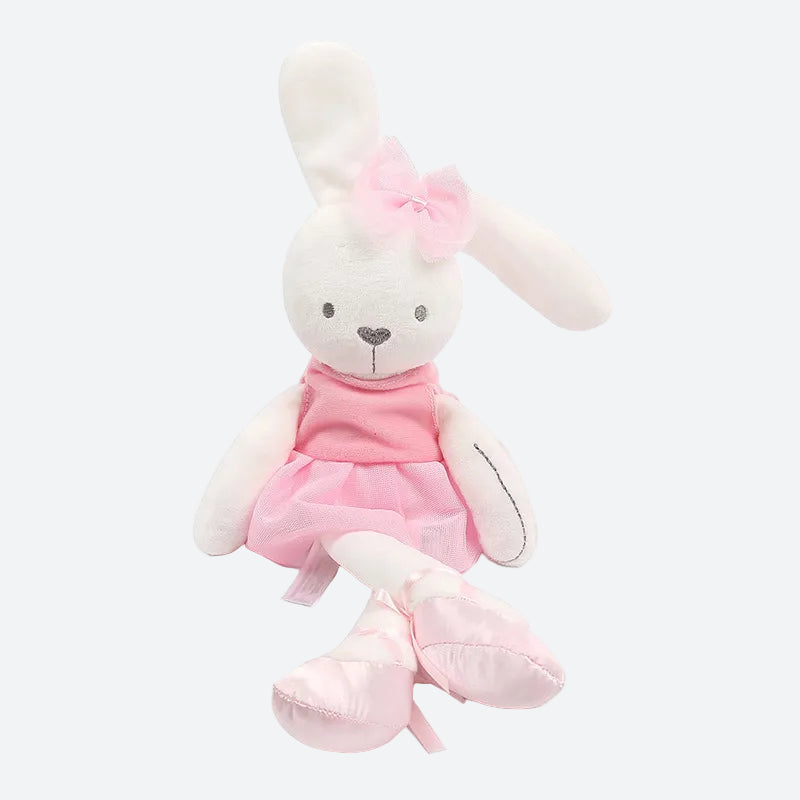  LEA, le lapin bébé en peluche vêtu d'une adorable robe rose, de ballerines et d'un noeud sur la tête. Cette peluche ravissante sera le compagnon idéal pour votre enfant. Image