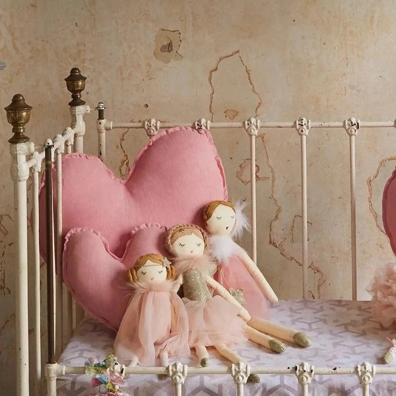 Trois doudou fées dans un lit Image