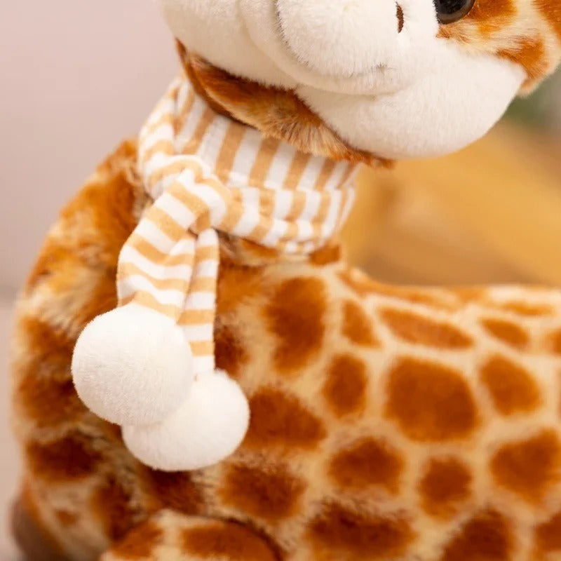 Peluche girafe à écharpe zoom sur l'écharpe