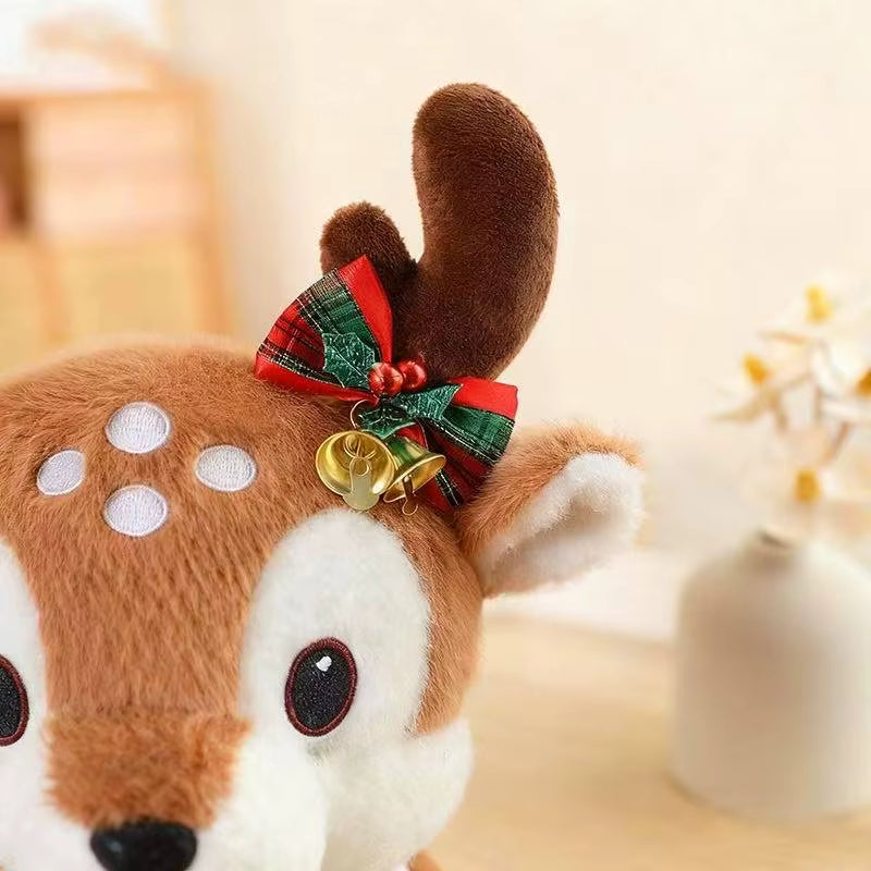 Peluche cerf de Noel de profilzoom sur le noeud