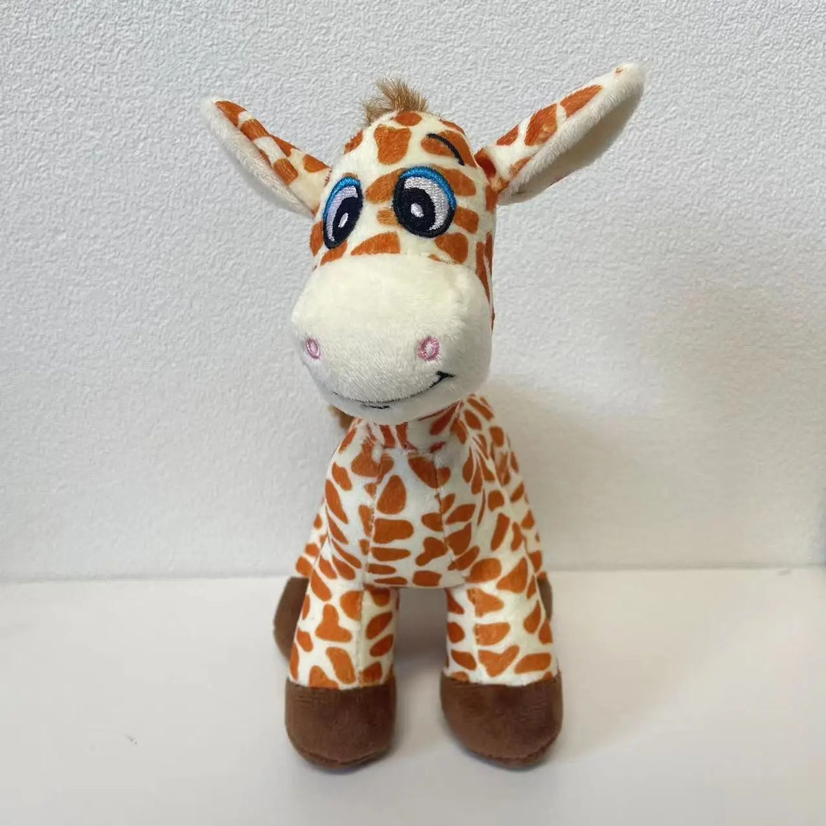 Peluche girafe à grands yeux - Sylvie de face