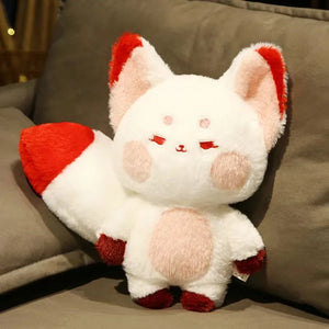  ALI, le doudou peluche renard aux multiples couleurs éclatantes et aux yeux d'or étincelants. Disponible en deux tailles, 60cm et 100cm, ALI apportera une touche de magie à chaque étreinte.