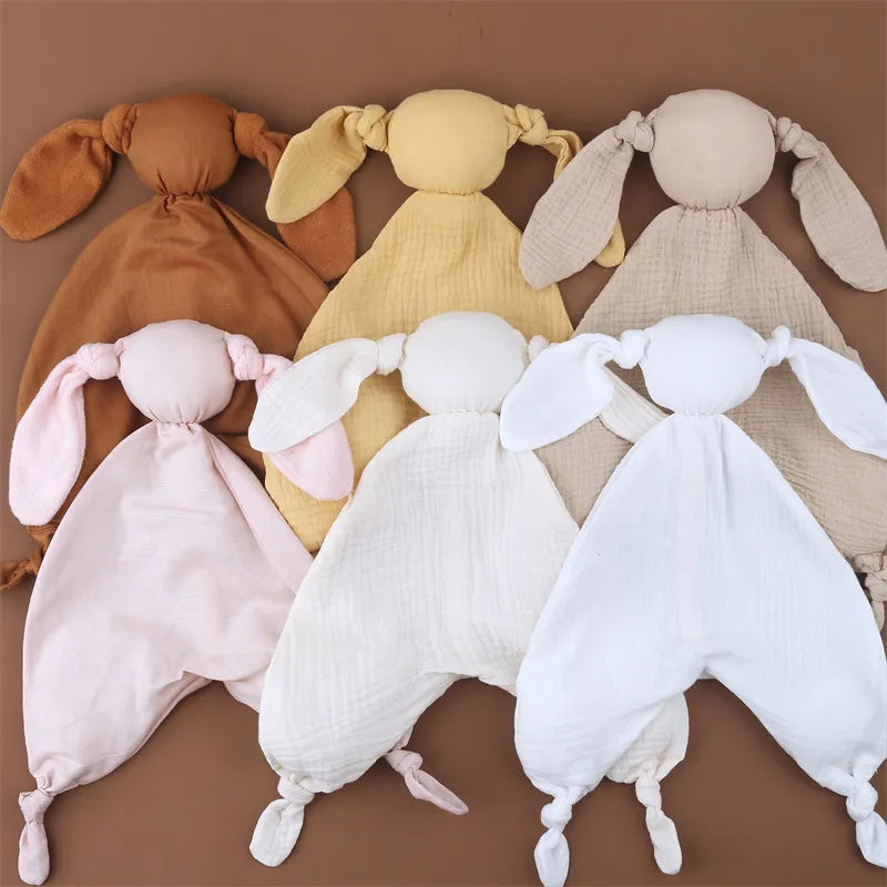 doudou mignon/ doudou attache tétine/ doudou plat/ doudou peluche/ doudou étiquettes/ doudou garçon / doudou tout doux/ doudou fille / doudou bébé / doudou lapin/ doudou bleu rose / gaze de coton / doudou gaze de coton / doudou rose / doudou maron / doudou bleu / doudou blanc / doudou jaune / motif / doudou gris / doudou vert / doudou orange Image