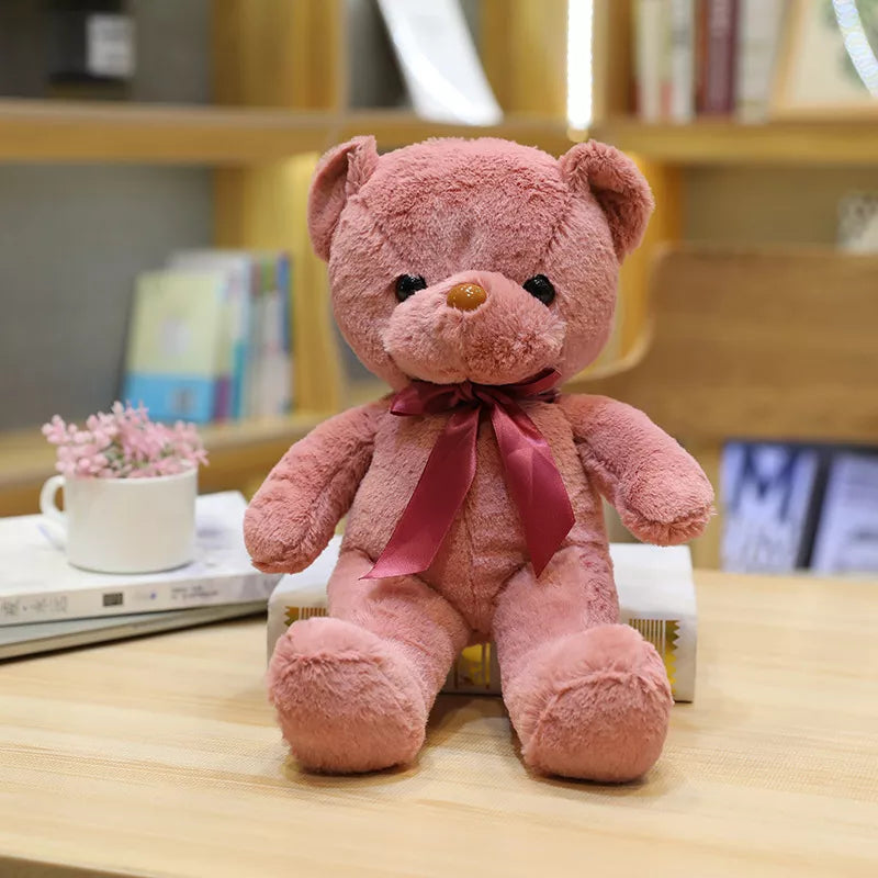 Découvrez la magie de l'enfance avec JEAN-MARC, le doudou peluche bébé ours disponible en 10 couleurs. Avec ses 30 cm de tendresse et son élégant noeud au cou, JEAN-MARC est prêt à devenir le compagnon de jeu préféré de votre tout-petit.