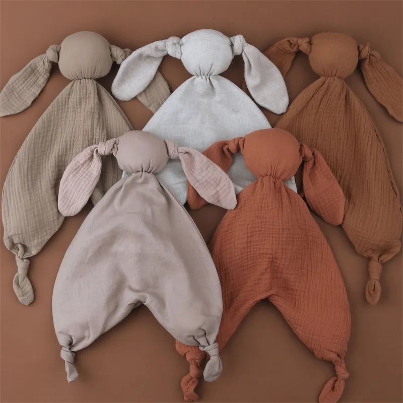 doudou mignon/ doudou attache tétine/ doudou plat/ doudou peluche/ doudou étiquettes/ doudou garçon / doudou tout doux/ doudou fille / doudou bébé / doudou lapin/ doudou bleu rose / gaze de coton / doudou gaze de coton / doudou rose / doudou maron / doudou bleu / doudou blanc / doudou jaune / motif / doudou gris / doudou vert / doudou orange