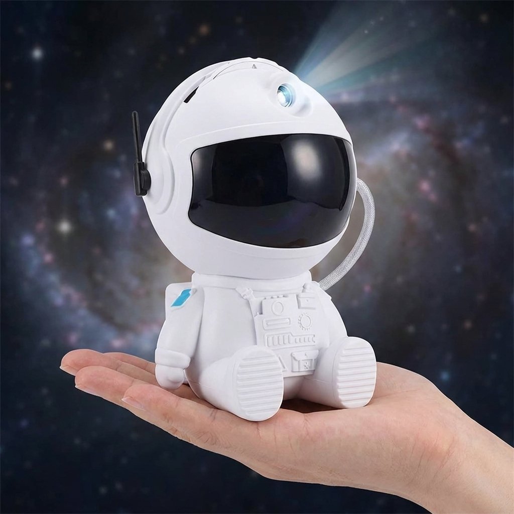 Projecteur astronaute tenu dans la main