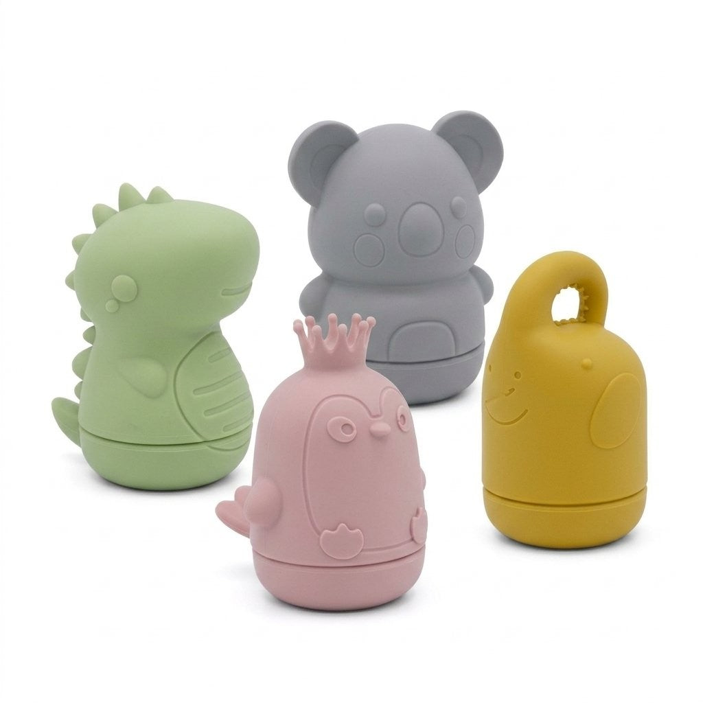 Quatre jouets de bain en silicone : dinosaure, koala, oiseau et éléphant