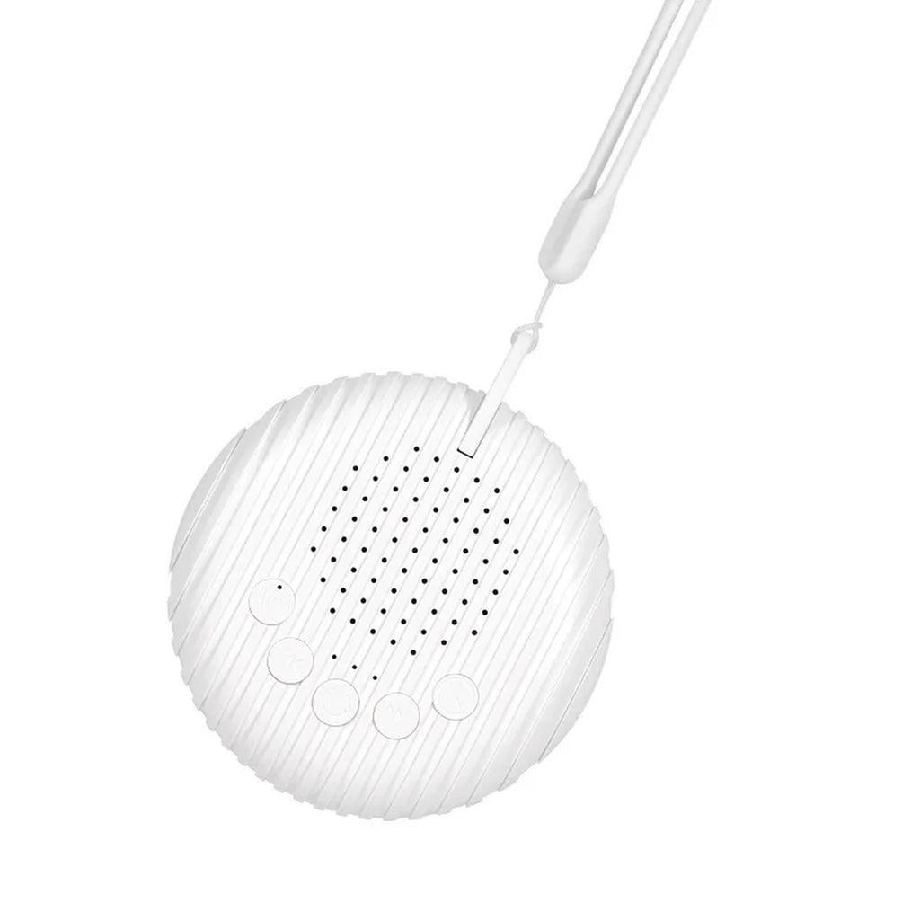 Machine à bruit blanc bébé ronde et blanche avec son cordon de suspension