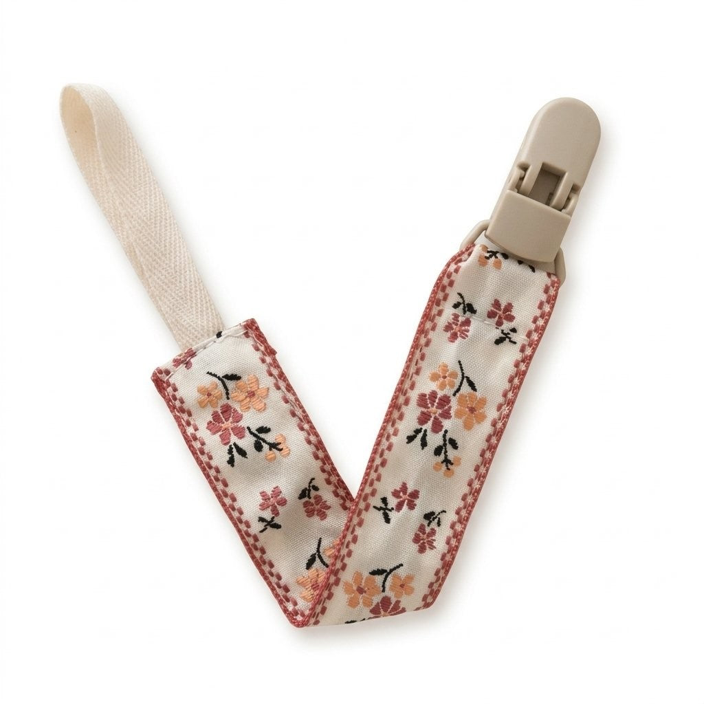 Attache tétine ruban brodé fleurs corail