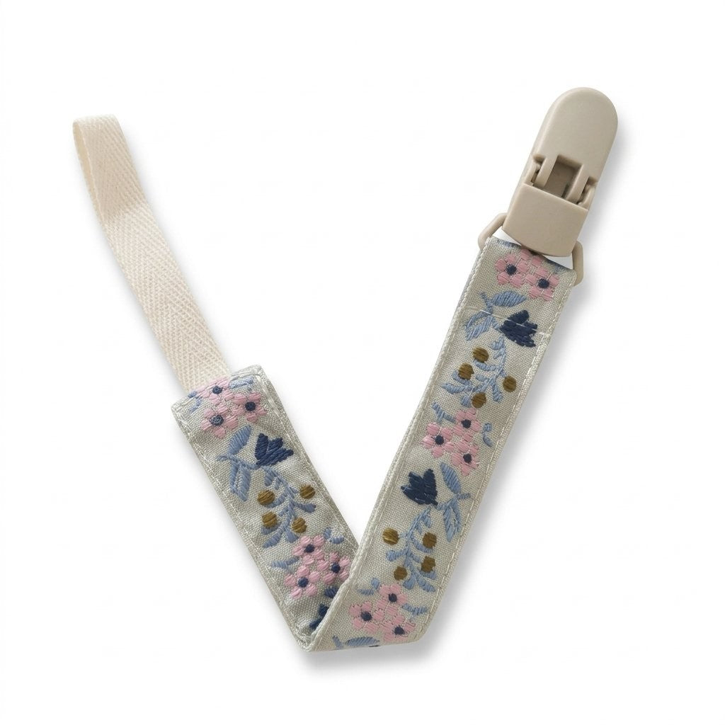 Attache tétine ruban brodé fleurs roses