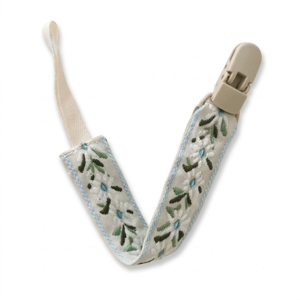 Attache tétine ruban brodé feuillage