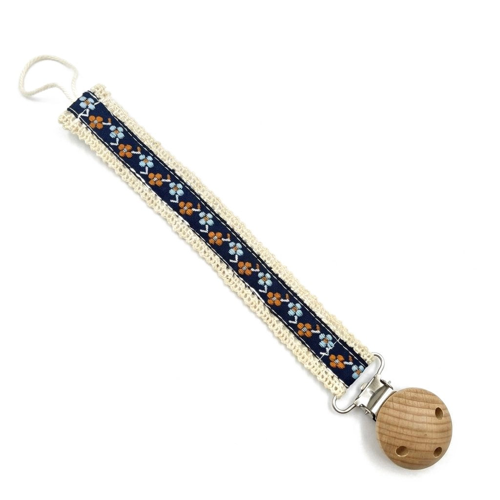 Attache tétine ruban à fleurs fleurs bleu marine