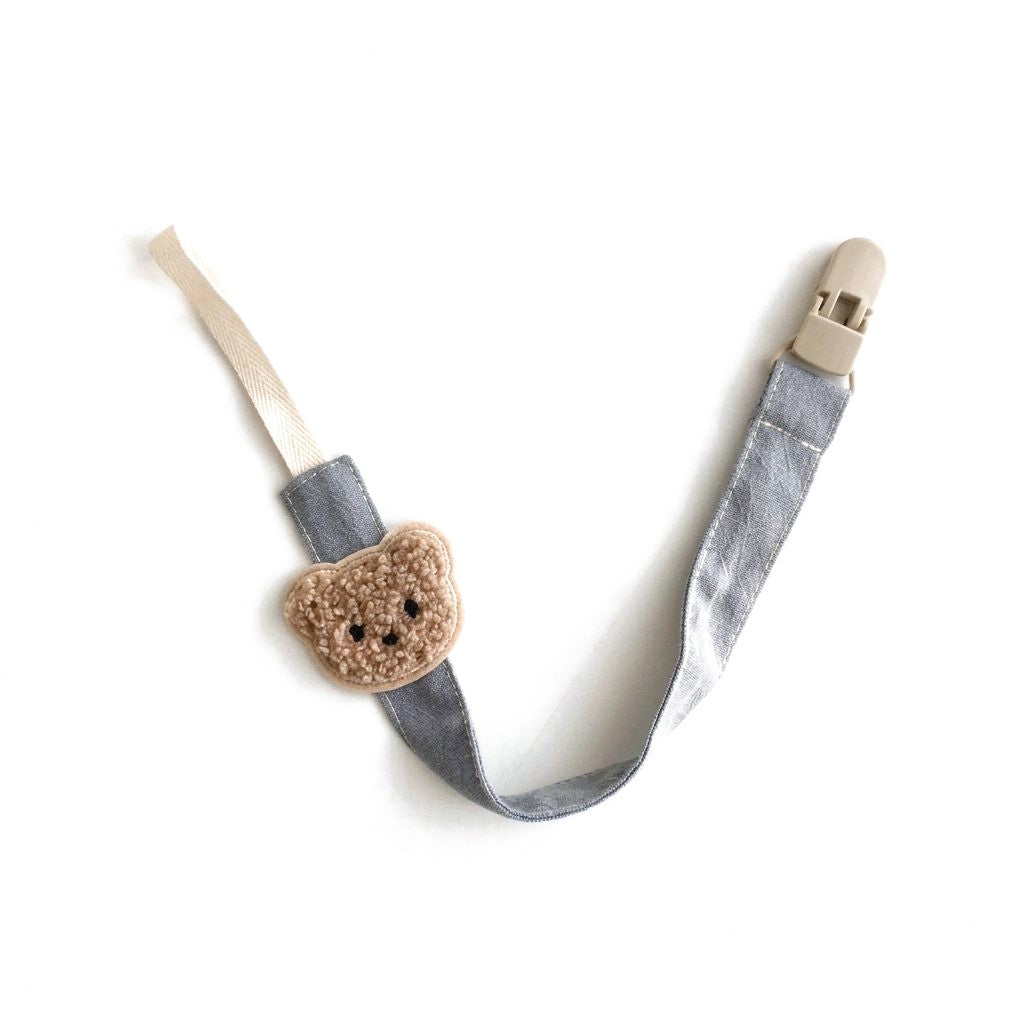 Attache tétine ourson en tissu gris bleu