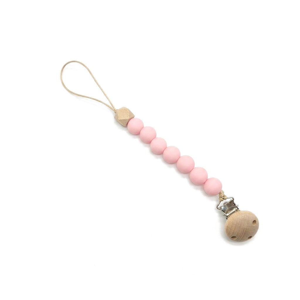 Attache-tétine perles en silicone rose poudré, clip en bois