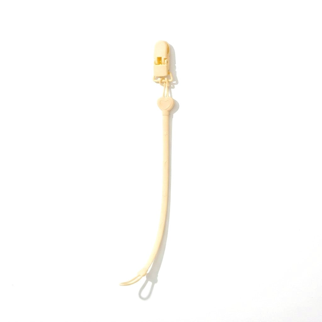 Attache silicone beige pour tétine et anneau de dentition