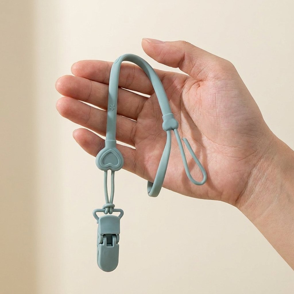 Attache silicone tenue dans la main