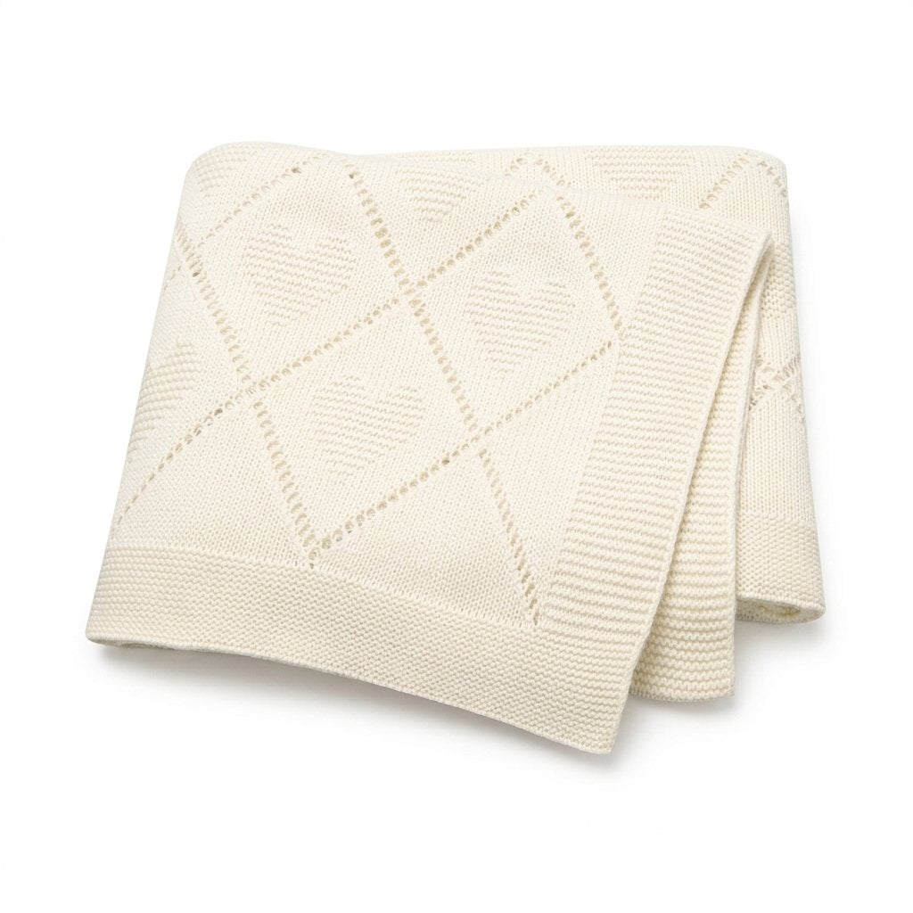 Couverture bébé en tricot de coton écru