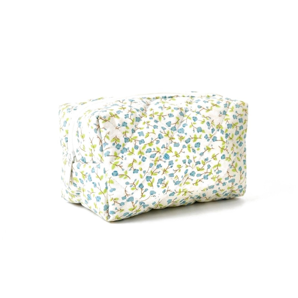 Trousse de toilette bébé matelassée à petites fleurs bleues