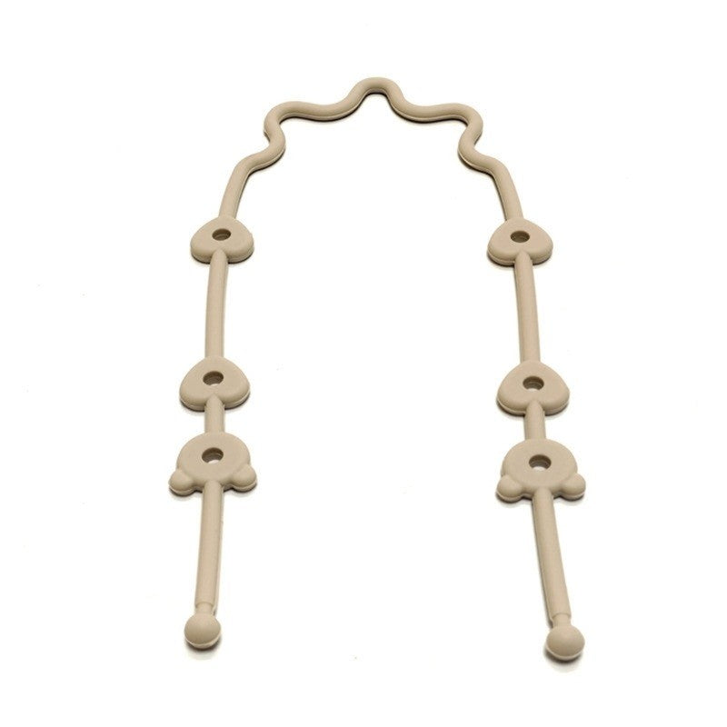 Attache jouet en silicone beige