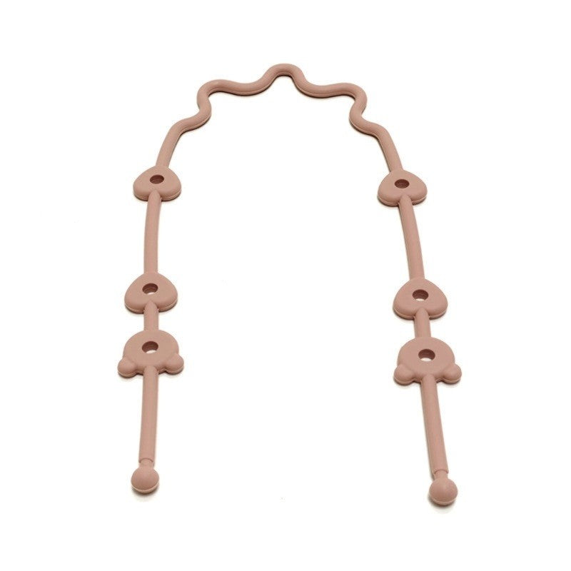 Attache jouet en silicone pêche