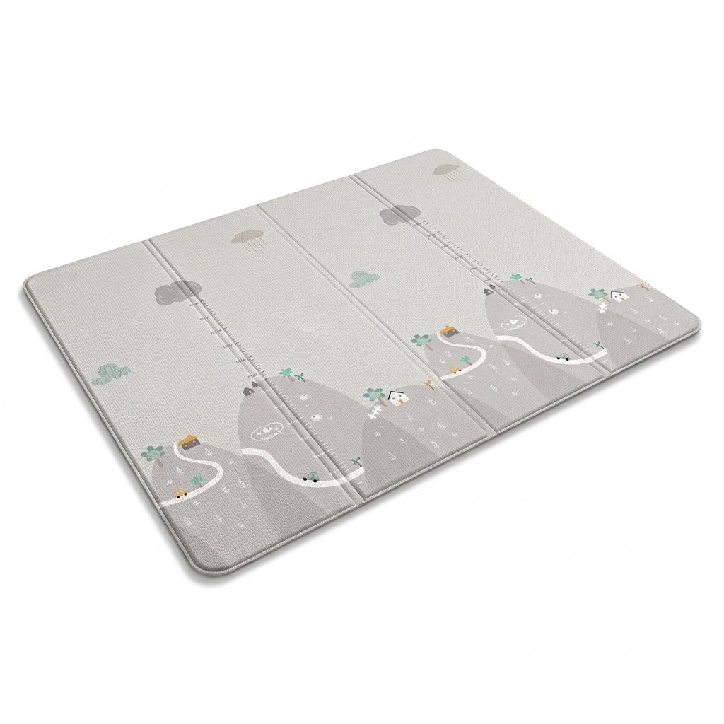 Face grise aux montagnes du tapis pliant